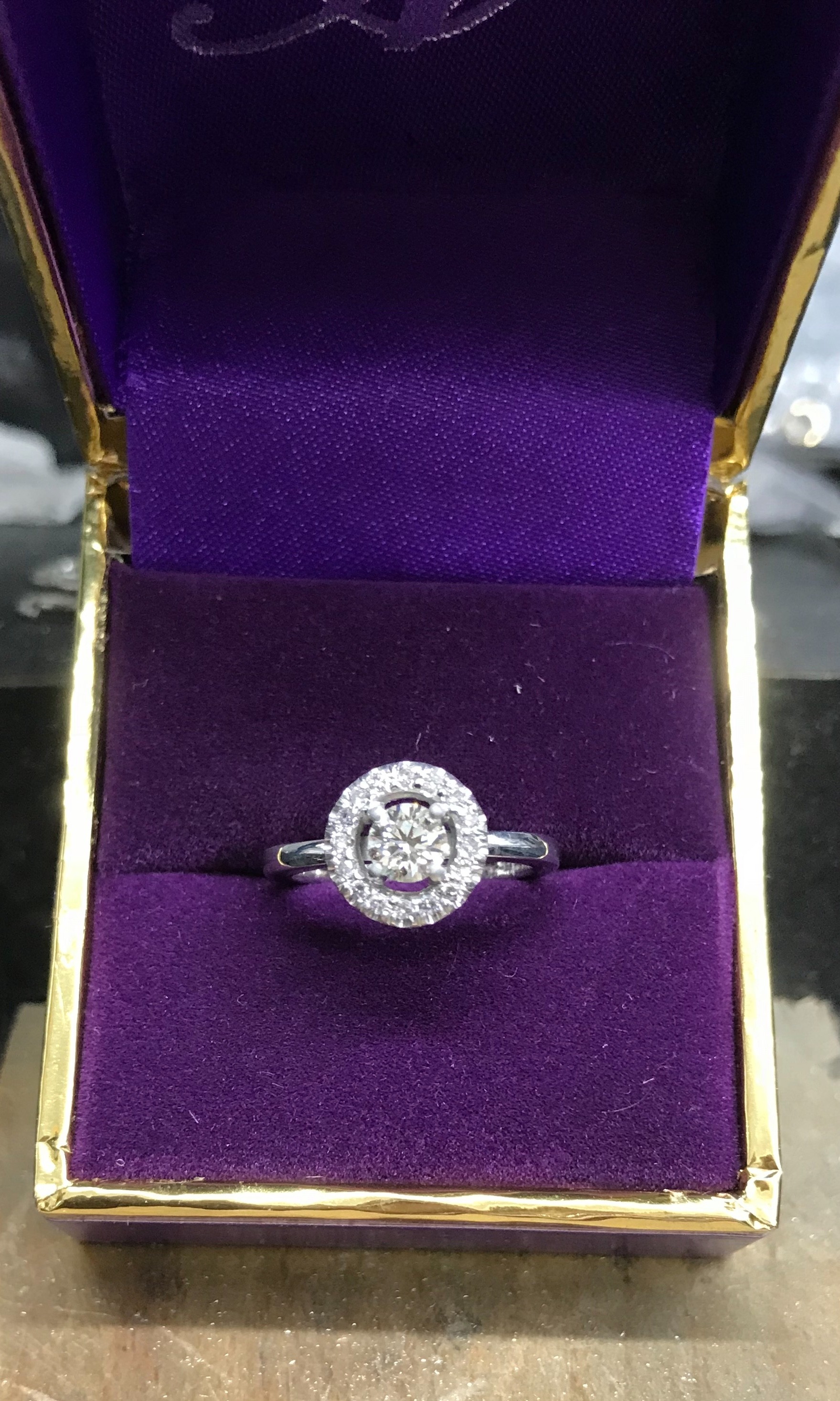 Halo style Diamond Ring