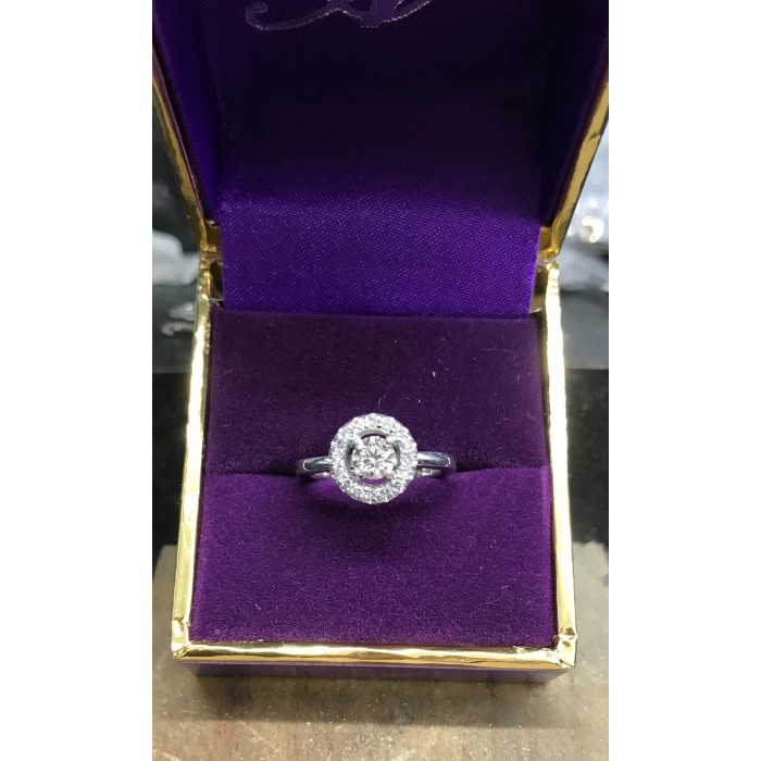 Halo style Diamond Ring